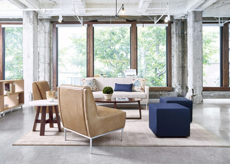 OFS Dess lounge chairs in a bright lobby