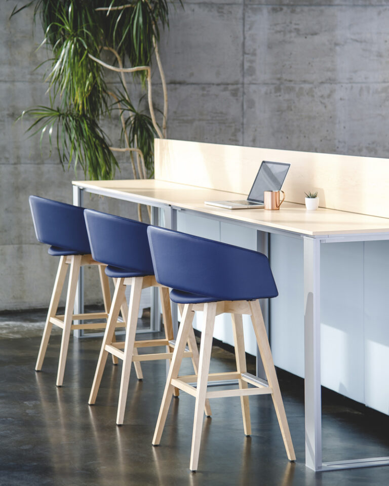 Rouillard Mini blue bar stools at a counter