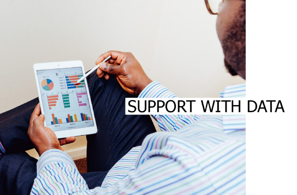 Person holding a tablet with charts with the caption Support with data