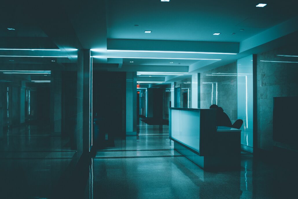 Office hallway in blue-green light